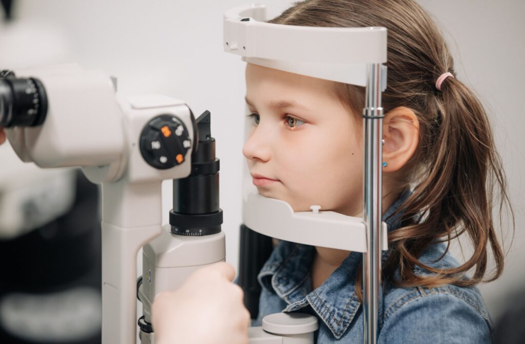 A young patient undergoing an eye exam to check for signs of diabetes.