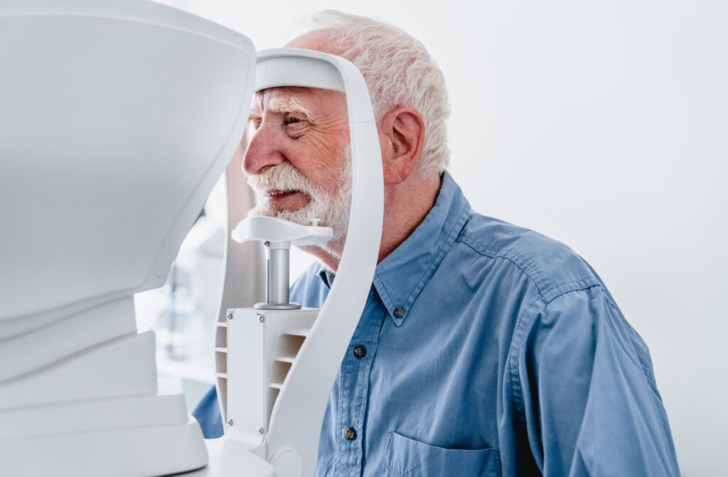 An older adult gets an eye exam to look for cataracts and other age-related eye conditions.